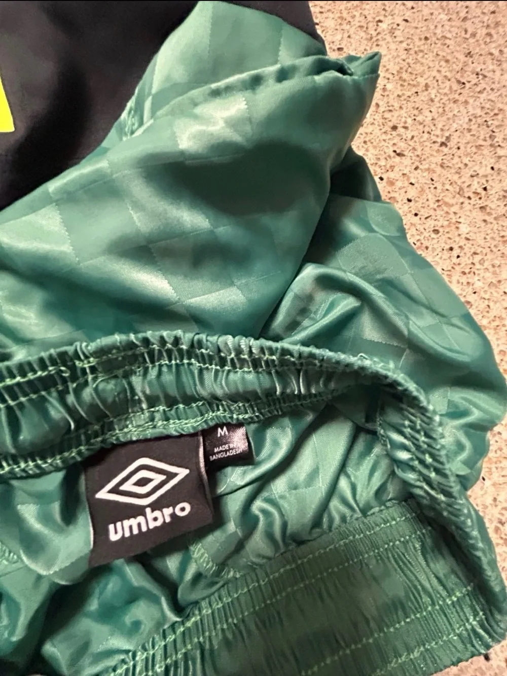 BUNDLE of 4 Umbro boys' athletic  shorts with a embossed retro checkered pattern